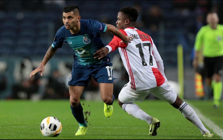 El “Tecatito” Corona (izquierda) jugó durante todo el encuentro en el que los portugueses alcanzaron su boleto a la siguiente ronda del certamen. AP/M. Pereira