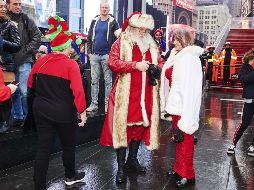 Muchos de los participantes lucieron sus mejores galas navideñas en el evento. AFP/G. Jones