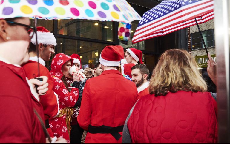 Muchos de los participantes lucieron sus mejores galas navideñas en el evento. AFP/G. Jones