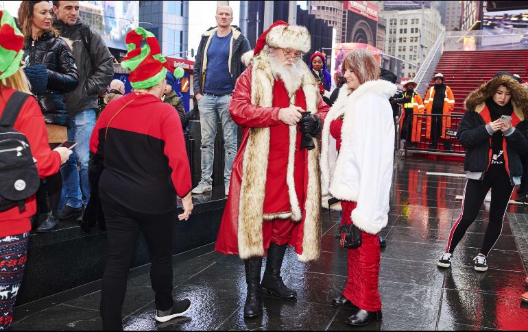Muchos de los participantes lucieron sus mejores galas navideñas en el evento. AFP/G. Jones