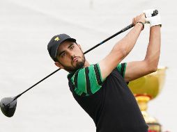 En el cuarto y último día de competencia enfrentó a Tiger Woods, con quien cayó 3-2. EFE/S. Barbour