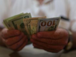 Este martes, la moneda se adquirió en un mínimo de 17.80 pesos. EL INFORMADOR/ARCHIVO