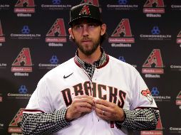Nueva “piel”. Madison Bumgarner vistió ayer por primera vez la franela de Arizona. AP/M. York