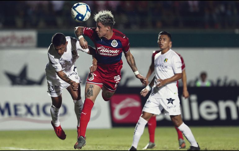 Seguido. Cristian Calderón (centro), recién llegado al Guadalajara, podría ser uno de los jugadores del Rebaño que esté disputando el Preolímpico de Concacaf. IMAGO7