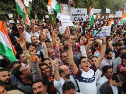 Las protestas estallaron después de que la Cámara Alta del Parlamento aprobara una enmienda a la Ley de Ciudadanía, que busca favorecer a quienes llegaron de Afganistán, Bangladesh o Pakistán. AP / A. Solanki
