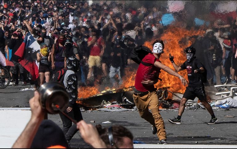 En Chile, un aumento del precio del transporte genera en octubre una extraordinaria movilización popular que se prolongó en noviembre y diciembre. AFP/ARCHIVO