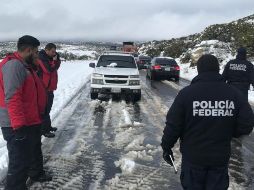 Las personas habían quedado atoradas en un vehículo en las cercanías del Rancho Pino Colorado, según informó el ayuntamiento de Ensenada. TWITTER / @depcbc