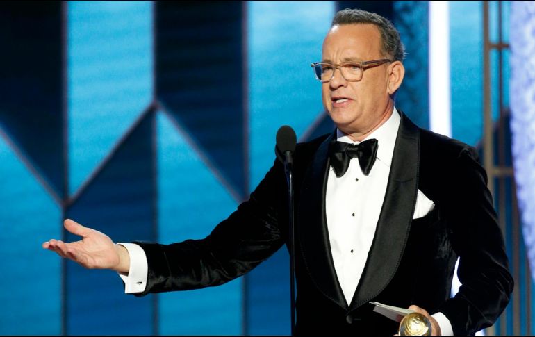 La actriz Charlize Theron fue la encargada de entregar el premio honorífico a Hanks. AP / P. Drinkwater