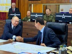 Putin y Asad en una reunión en Damasco este martes. Es la primera visita del mandatario ruso a la capital siria en nueve años de guerra. AP/Presidencia siria