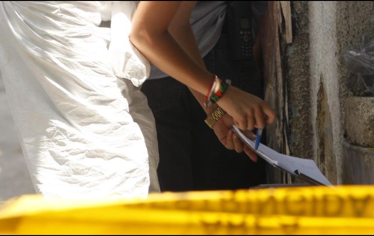 Llegaron al lugar representantes del Ministerio Público del área de Homicidios, así como peritos forenses. EL INFORMADOR / ARCHIVO