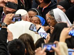 El Papa se mostró de buen humor y repartió saludos y bendiciones a todos los asistentes. AFP/A. Solaro