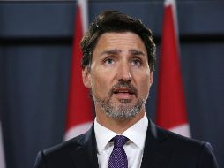 Justin Trudeau dijo en conferencia de prensa que el lanzamiento contra el avión pudo no ser intencional. AFP/D. Chan