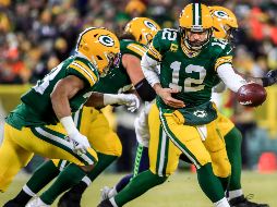 Rodgers terminó su labor con 16 pases completos de 27 intentos para 243 yardas y dos touchdowns. EFE / T. Maury