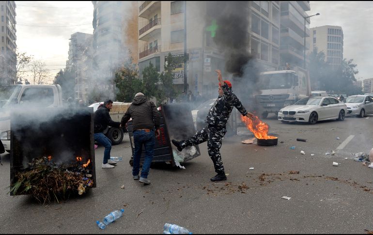 Ante la crisis de seguridad que se vive en el país, autoridades bancarias preparan medidas para proteger el dinero de los cuentahabientes. EFE/W. Hamzeh