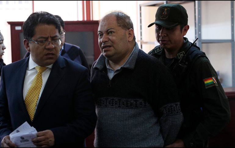 Romero (c) está acusado por la presunta comisión de los delitos de 