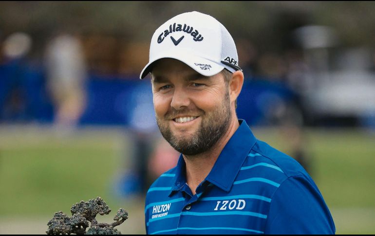 Campeón. El golfista australiano consiguió el quinto título de su carrera gracias a una ronda de 65 golpes. AFP / S. Haffey