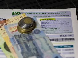 Jugadores rojinegros celebran tras el primer gol conseguido por Luciano Acosta, aunque en esta ocasión la Fiel no estuvo presente. EL INFORMADOR/A. Camacho