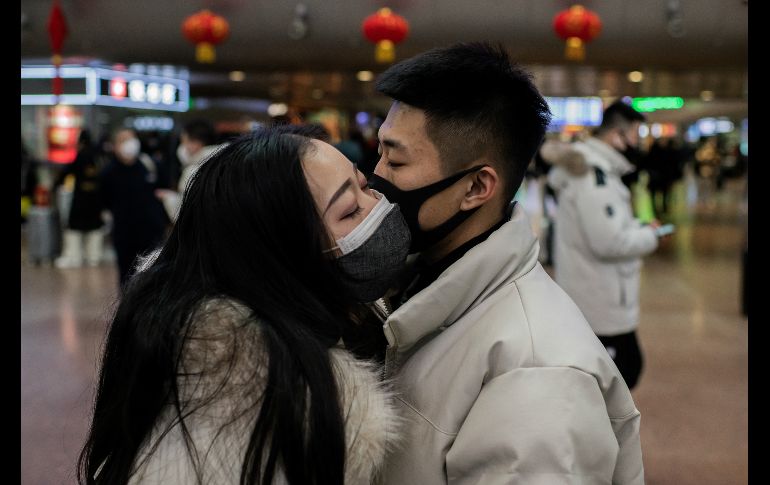 La despedida en una estación de trenes en Pekín. AFP/N. Asfouri