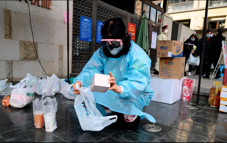 Como en otras ciudades chinas, las personas encerradas en complejos de vivienda podrán seguir recibiendo pedidos de comida y otros artículos. AFP/ARCHIVO