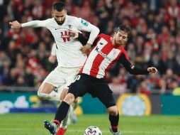 Iker Muniain. El mediocampista de los vascos (derecha) marcó el gol del triunfo en casa.  EFE