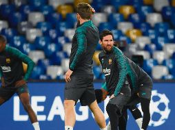 RECONOCEN. Encabezados por el capitán Lionel Messi, los jugadores blaugranas realizaron su última práctica ayer en el Estadio San Paolo. AFP