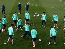 PREPARADOS. El conjunto merengue completó su último entranamiento de cara a recibir al City en el Santiago Bernabéu. AP