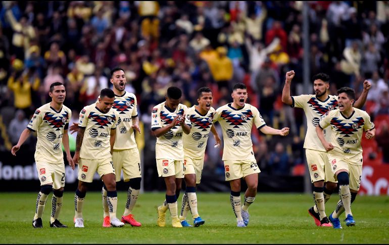 LIBERADOS. El América respira al calificar a los Cuartos de Final, tras una eliminatoria muy ríspida ante el conjunto guatemalteco. AFP