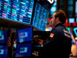 Advierten que si el Covid-19 llega a Estados Unidos, la caída bursátil se acentuará aún más. AFP/J. Eisele