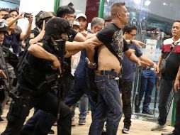 Policías arrestaron al hombre, identificado como Archie Paray. EFE / EPA / M. Cristino