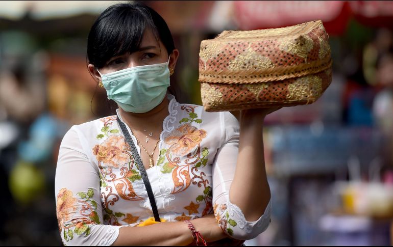 Señalan que todos los casos de coronavirus son importados, todavía no tienen detectados casos por contagio en el territorio. AFP / S. Tumbelaka
