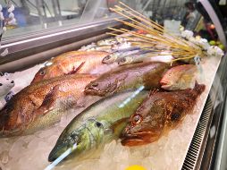 Entre 50 y 130 pesos pagados por mariscos se deben al hielo que los recubre. AFP/Archivo