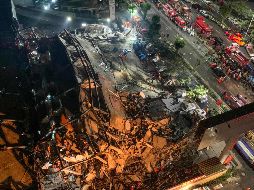 Se cree que el derrumbe pudo haber sido ocasionado por obras de redecoración y la construcción de dos supermercados en la planta baja. AFP /