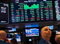 Luego de que algunos países y bancos centrales tomaran medidas financieras ante la pandemia de coronavirus, los mercados finalizaron en terreno positivo. AP/M. Lennihan