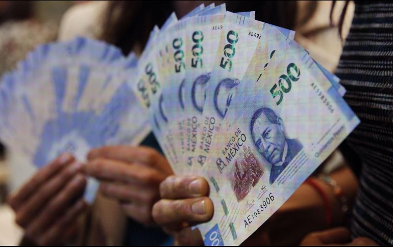 La circulación de billetes y monedas aumentó durante la semana en que se hizo la declaratoria de emergencia y comenzaron a cerrar los centros comerciales. EFE / ARCHIVO