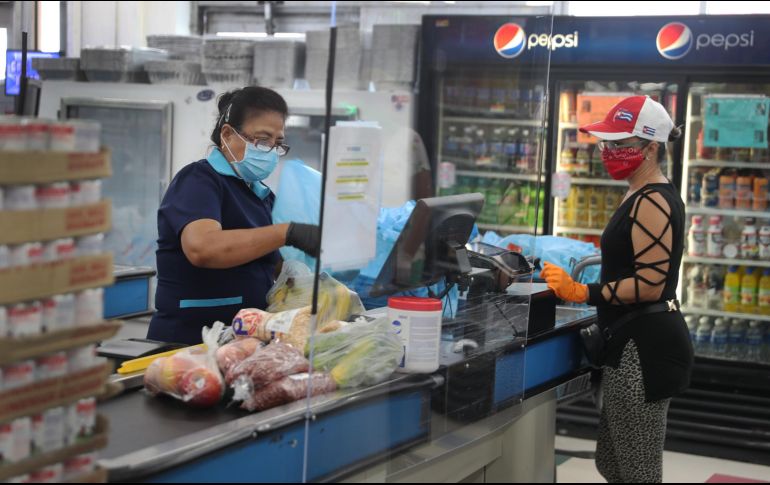 La primera parte del plan de Jalisco se centra en la entrega de préstamos a autoempleados, pequeñas y medianas empresas y apoyos a maiceros. AFP/J. Raedle