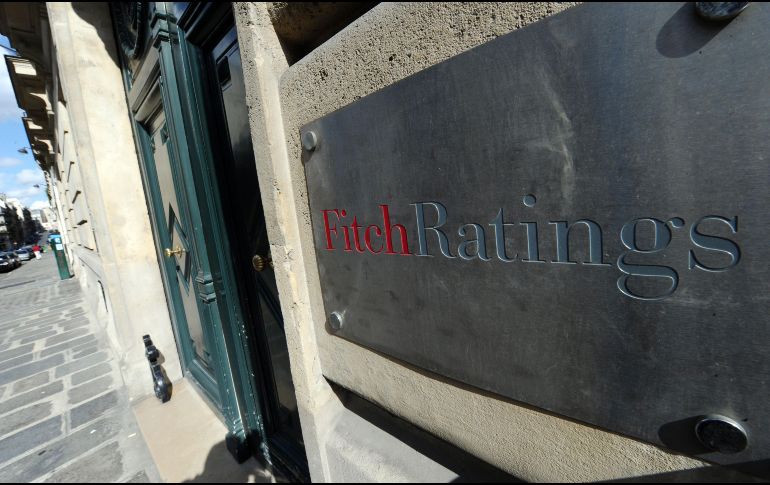 La calificadora anticipa un mayor deterioro en el clima de negocios en ciertos sectores. AFP/ARCHIVO