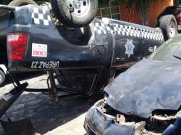 La patrulla terminó volcada sobre su toldo tras el impacto. ESPECIAL