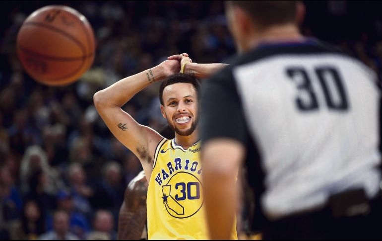 REDUCCIÓN. Steph Curry, el mejor pagado de la Liga, no recibirá los 40.2 MDD de su salario. AFP • E. Shaw