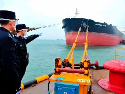 A pesar de la recuperación en las actividades manufactureras, las empresas chinas sobre todo las más pequeñas, enfrentan retos e incertidumbre. AP / Chinatopix