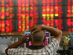 El estímulo fiscal valuado en dos billones de dólares que aprobó el Congreso estadounidense favoreció una jornada positiva. EFE/R. Yongrit