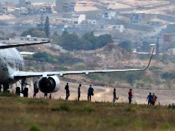Un grupo de más de 130 migrantes hondureños fueron deportados ayer de México. En la imagen, a su llega a Tegucigalpa. AFP/O. Sierra