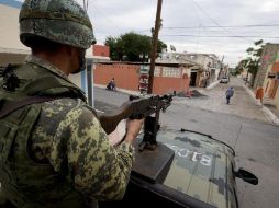 Destacan que las ciudades de Reynosa y Nuevo Laredo han quedado fuera de las urbes con mayor percepción de inseguridad a nivel nacional. AP/ARCHIVO