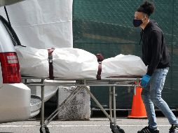 El decreto aprobado por el Congreso de Jalisco permite a los municipios omitir el pago de derechos por muertes a causa del coronavirus. AFP / B. Smith