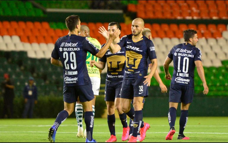 DUPLA LETAL. Dinneno y Carlos González se han complementado a la perfección para beneficio de los felinos. IMAGO7