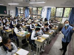 Autoridades de China no han confirmado fechas de reingreso a la aulas para alumnos del nivel primario y vocacional. AFP /