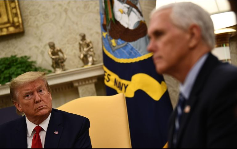Pence y Trump se niegan a usar cubrebocas, a pesar de una recomendación de los Centros para el Control y la Prevención de Enfermedades. AFP / B. Smialowski