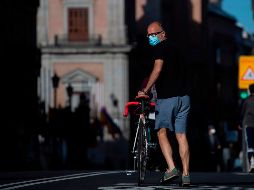 La primera fase permite reuniones sociales de hasta 10 personas e incluye la reapertura, con aforo limitado, de negocios, museos y terrazas de bares y restaurantes. AFP / P. Philippe Marcou