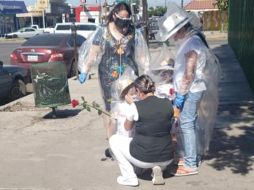 En un video difundido a través de Facebook, se observa a Anahí cuando fue sorprendida por sus tres hijas, quienes la abrazan y le obsequian algunos detalles. FACEBOOK/Mayra MPo