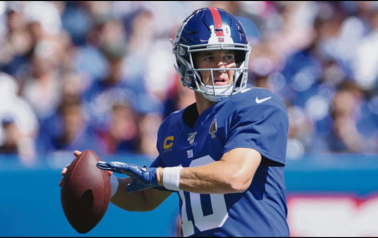 AÑO SABÁTICO. El ex quarterback de los Giants prefiere pasar más tiempo con su familia. AP