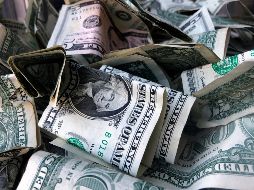 El dólar se cotizó en 21.83 pesos por unidad en el mercado interbancario, el peor nivel para la moneda mexicana desde septiembre del año pasado. AP/ARCHIVO